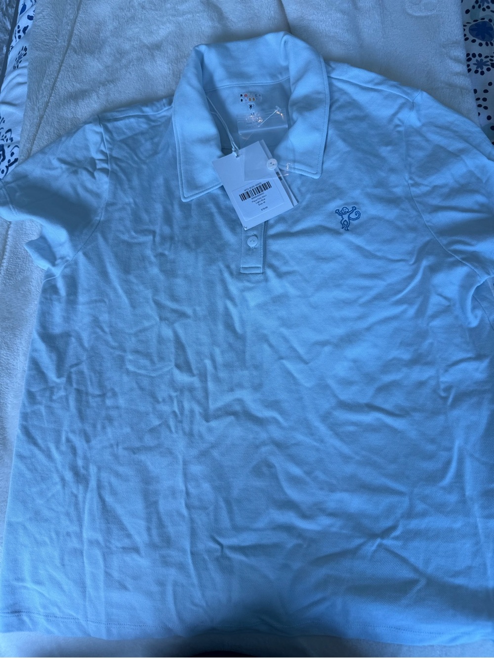 Women’s light blue roller rabbit polo